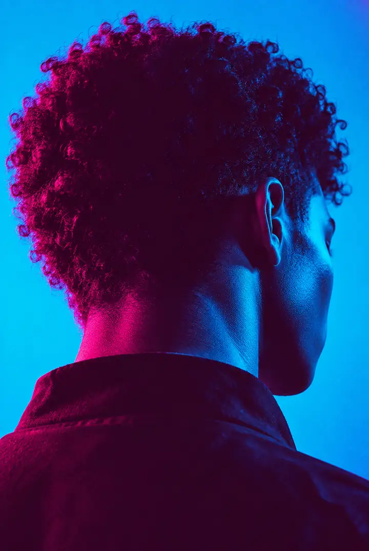 Blue and magenta duotone portrait on a music release poster